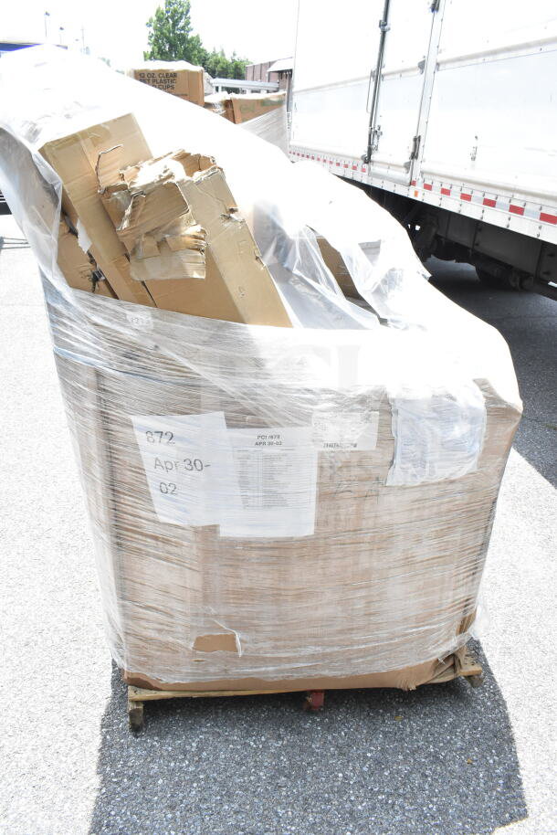 Pallet of 21 new scratch and dent items, wrapped in plastic. Includes boxes labeled "12 oz clear plastic cups" and shipping labels.