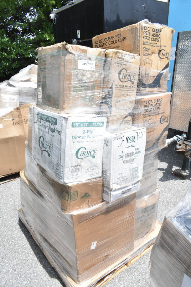 Pallet of scratch and dent boxes containing brand new cold cups, napkins, and hot cups, wrapped in plastic.