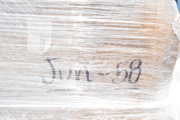 Shrink-wrapped pallet labeled "Jun-58," containing 25 scratch and dent items like glass racks, shelving, and ingredient bins. Brand new condition.