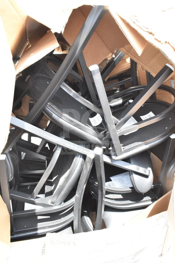 Box of 12 brand new chairs with minor scratches and dents. Black frames, some labels visible, bulk condition.