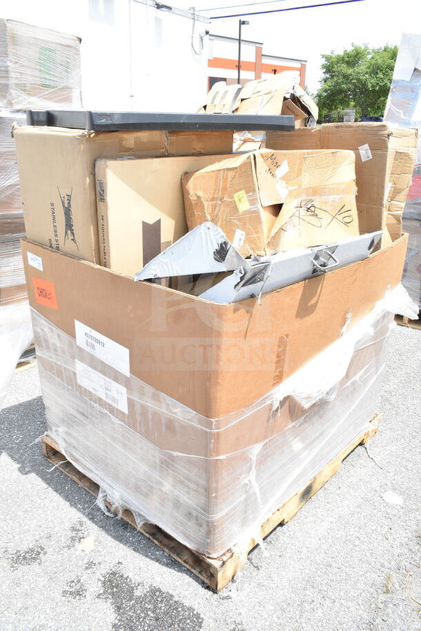 Bulk lot of 12 new but scratched/dented items, including mop sink and utility cart, in wrapped cardboard boxes on pallet.
