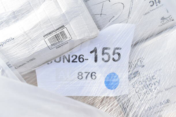 18 new scratch and dent items wrapped, including napkins and cups. Visible label reads "JUN26-155," "Made in China."