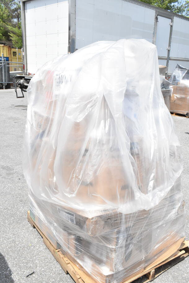 Shrink-wrapped pallet of 18 new scratch and dent kitchen items on auction. Contents include napkins, cold cups, bowls.