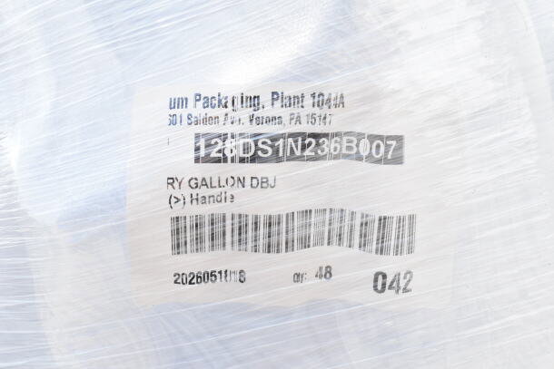 Pallet of new "Scratch and Dent" gallon containers wrapped in plastic. Label shows "RY GALLON DBJ," quantity 48.