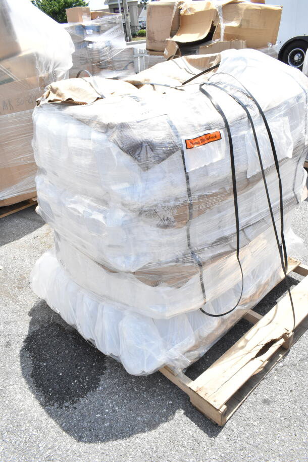 Pallet of new scratch and dent gallon containers shrink-wrapped, labeled "Pending Re-Stocked," auction item.