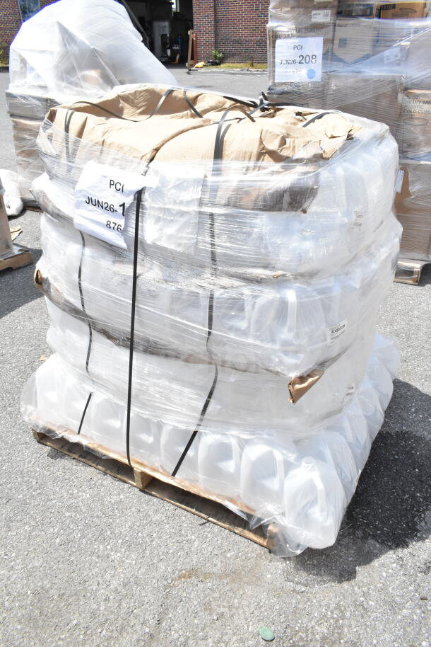 Pallet of new gallon containers, some with minor damage, wrapped in plastic with visible labels, marked "PCI JUN26.1 876".