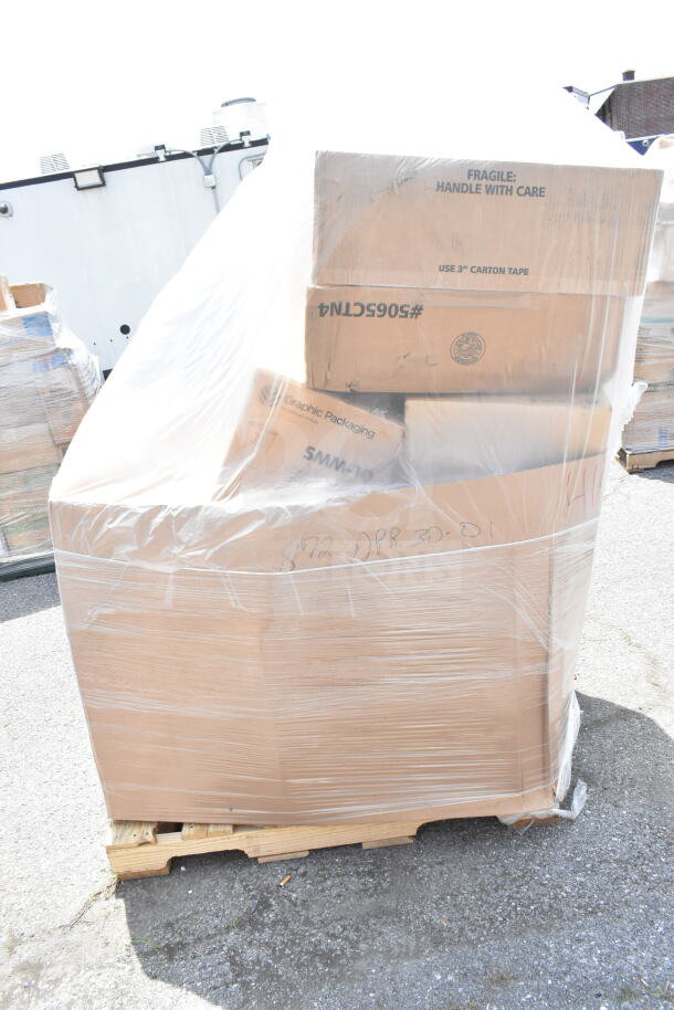 Shrink-wrapped pallet of 14 brand new scratch and dent items, including boxes labeled "Graphic Packaging" and "Fragile: Handle with Care."