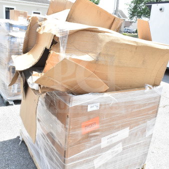 Pallet with wrapped cardboard boxes labeled "217" and "CHICKEN," indicating scratch and dent auction items including chafer and bussing cart.