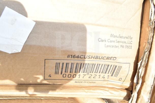 Cardboard box marked with product code #164CUSHBUCRED and barcode, made in China for Clark Core Services, LLC.