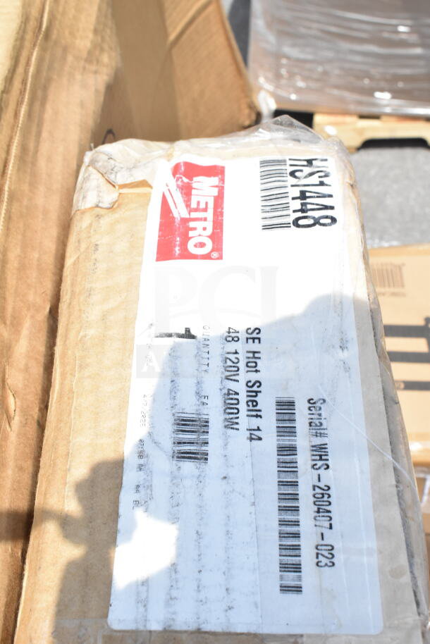 Cardboard box with Metro label for SE Hot Shelf 14, 48" 120V 400W. Includes barcodes and serial #WHS-260407-023.