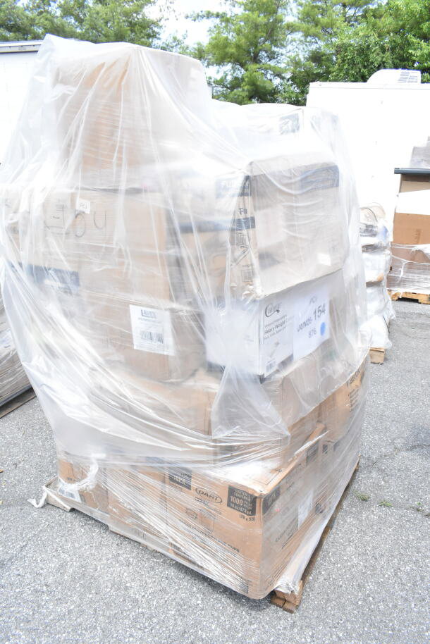 Pallet of 24 scratch and dent items including cold cups, hot cups, and containers, wrapped in plastic on a warehouse floor.
