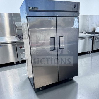 True TG2R-2S solid door reach-in refrigerator, 56 cu. ft., stainless steel, top-tier condition, UL/NSF listed, 115V.