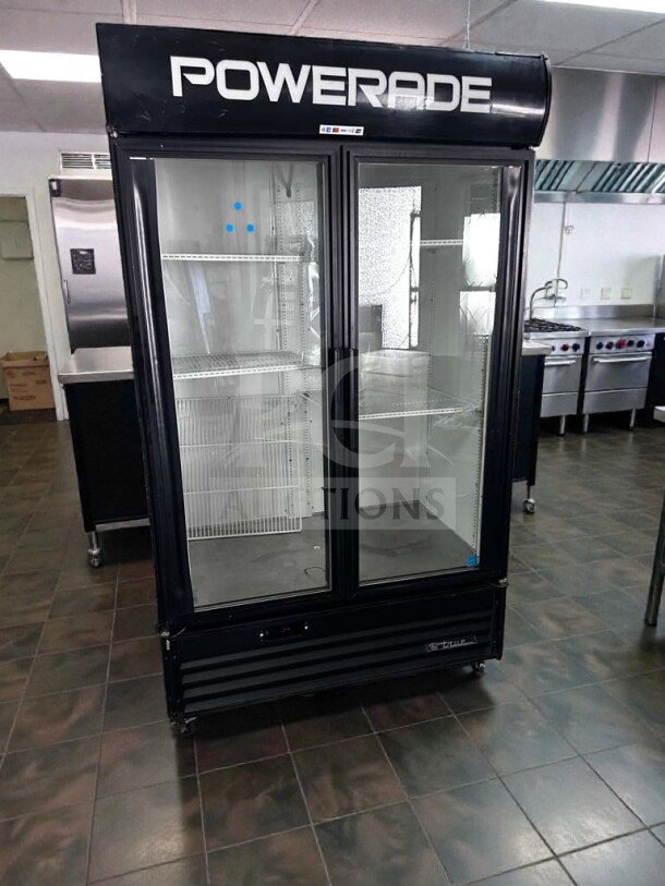 True GDM-43EM Powerade glass door merchandiser refrigerator; 2 swing doors; excellent condition; ENERGY STAR/NSF certified.
