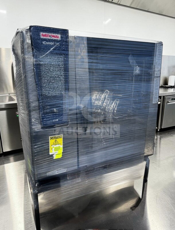 Rational iCombi Pro LM100EG.AX 6-pan gas combi oven, top-tier condition, 208/240V, 1 phase, fully tested, caution sticker visible.