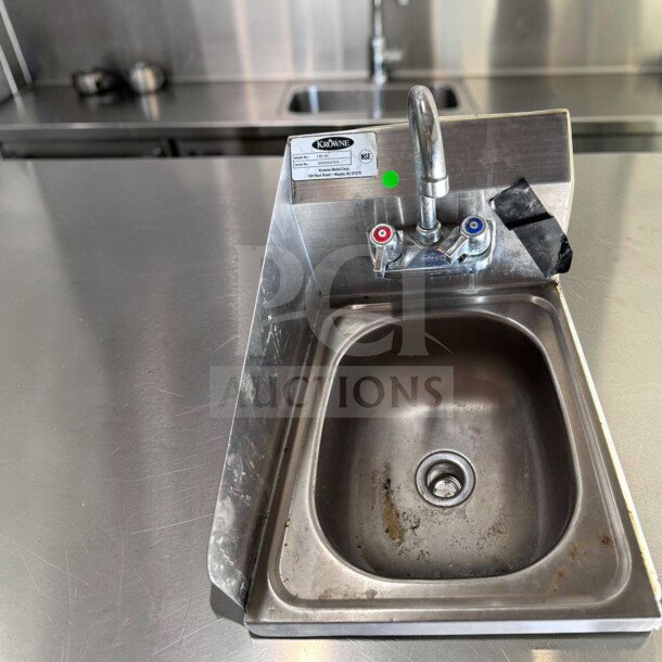 Krowne HS-9L wall mount hand sink with 9 3/4" x 11 3/4" bowl, low lead faucet, NSF certified, stainless steel, used condition.