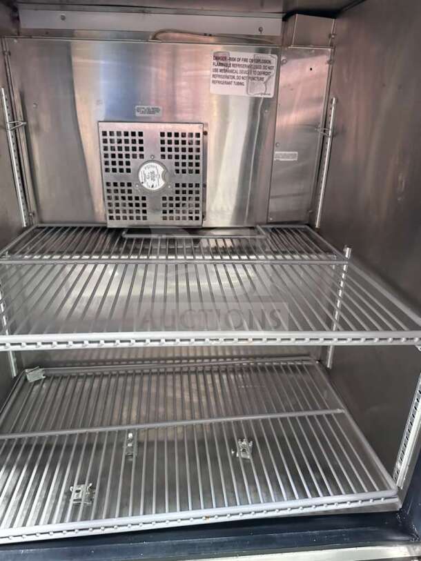 True TUC-27G-HC undercounter refrigerator, stainless steel, glass door, shelving inside, excellent condition, tested operational.