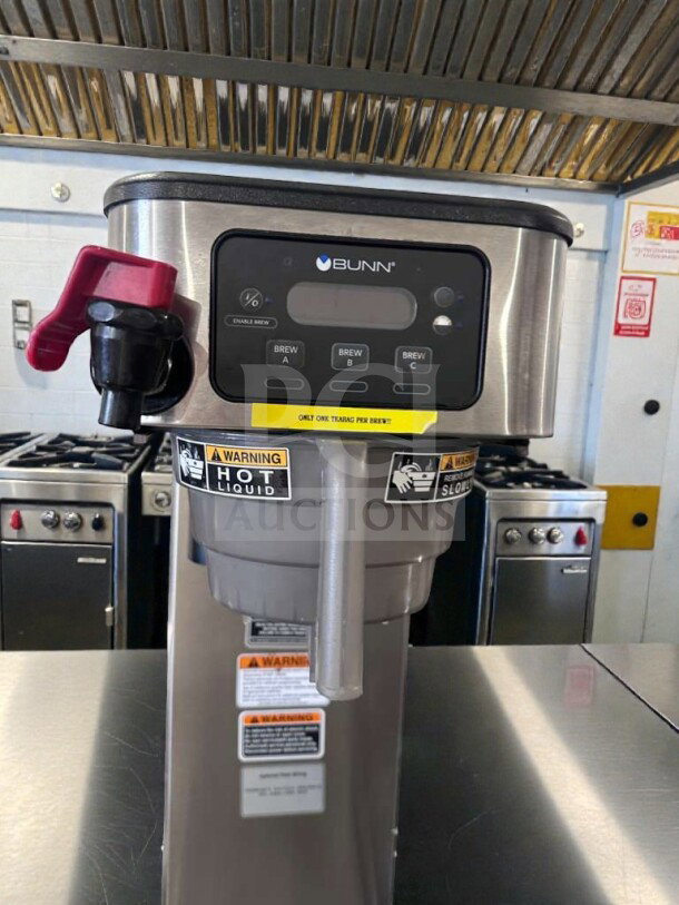 High-grade Bunn-O-Matic ITCB-DV 29” coffee brewer, digital controls, 120V, UL listed. Excellent condition, safety warnings visible.