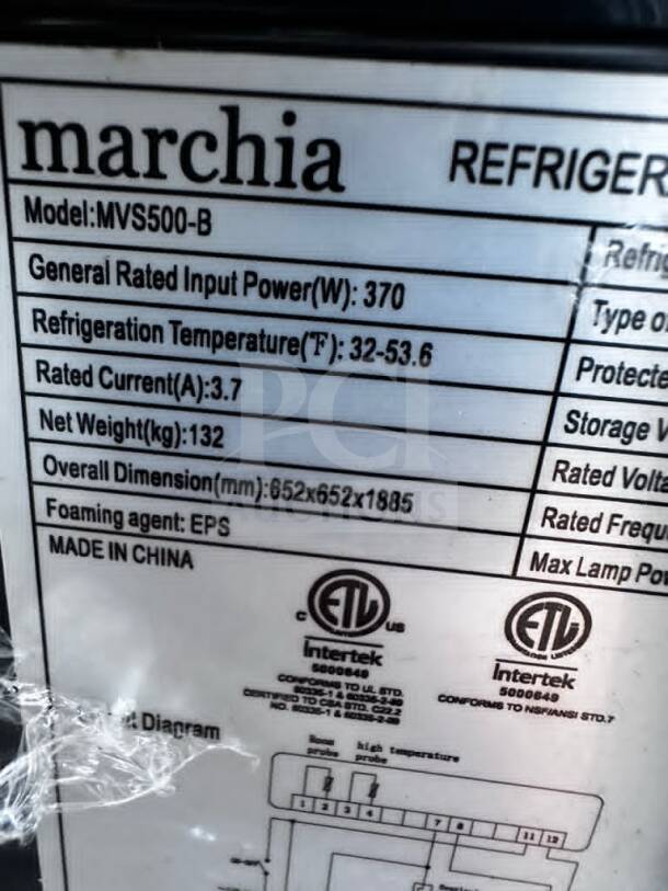 Marchia MVS500-B cake display case label, showing model, power, temperature range, dimensions, ETL/NSF certified.