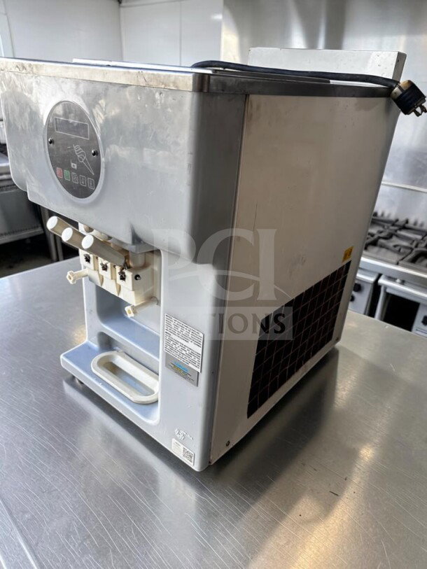 Carpigiani 193 SP/USA P soft serve machine, 2 flavor + twist, excellent condition, 208–230V, 3 Phase, UL/NSF listed.