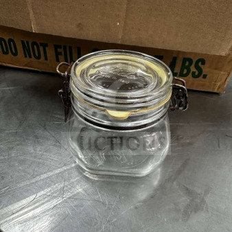 Bormioli Rocco Fido 1/2 Liter Glass Jar, pristine condition, airtight clamp lid, marked "Made in Italy," includes box.