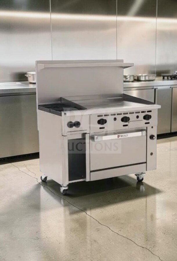 Wolf C48S-2B36G gas range, 48", 2 burners, 36" griddle, standard oven, cabinet base, 155,000 BTU, excellent condition.