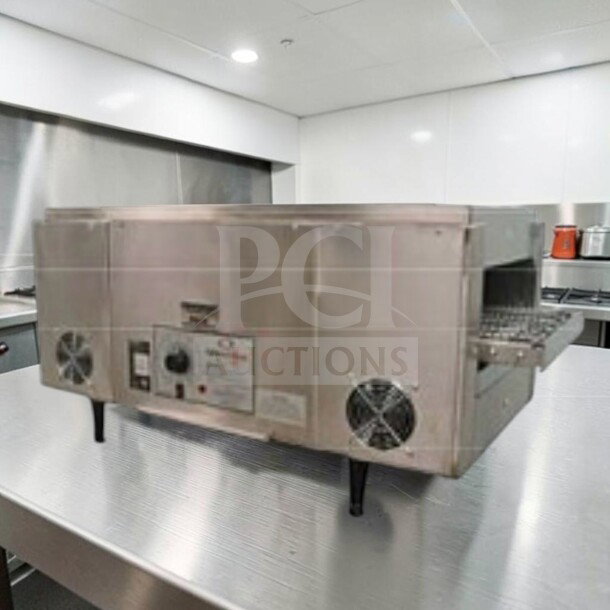 Star Holman QT14 conveyor toaster oven in excellent condition, stainless steel, 208/240V, fully operational, Quiznos style.