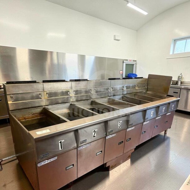 Pitco SSH55 commercial gas fryer battery with 5 units, 50 lb vats, natural gas, built-in filtration, fully tested, excellent condition.