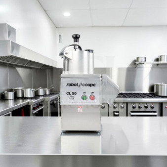 Robot Coupe CL50E Ultra commercial food processor, immaculate condition, 1 1/2 HP, 120V, with 2 discs, ETL listed, tested operational.