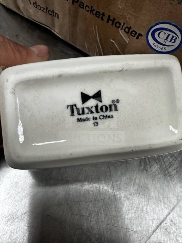 Tuxton BEQ-0452 eggshell china sugar packet holder, new, branding marked on base.