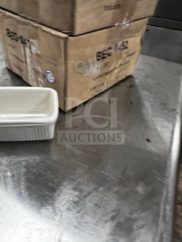 Tuxton BEQ-0452 eggshell china sugar packet holder, new, in box, ready for commercial use. Model TUX-S-CAD-1148. Quantity: 36.