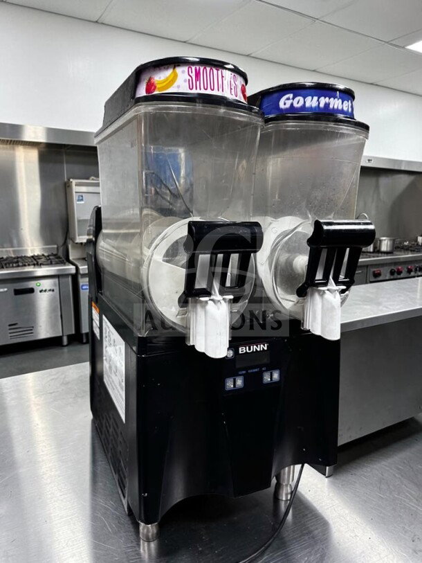 Bunn-O-Matic Ultra-2 Slushy Machine, black, 3-gallon dual tanks labeled "Smoothies" and "Gourmet." Prime condition, fully tested.