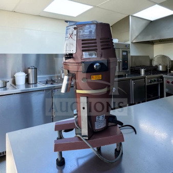 High-grade Mahlkönig VTA 6S commercial coffee grinder in excellent condition, fully operational, showing labels and power settings.