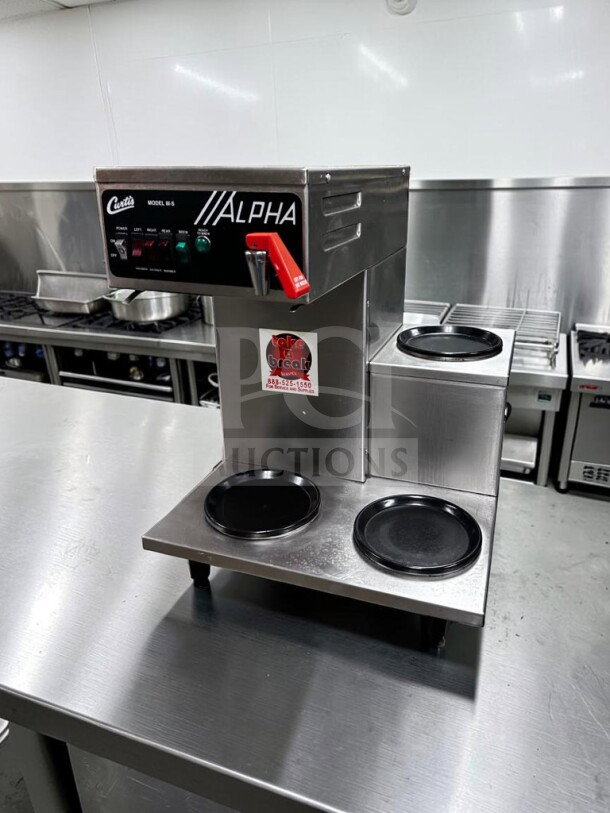 Wilbur Curtis ALPHA-IIIS 3-Station Coffee Brewer, stainless steel. First-class condition, fully tested and operational.