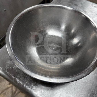 Stainless steel commercial salad/mixing bowl, 13" diameter, well-maintained, ready for commercial use.
