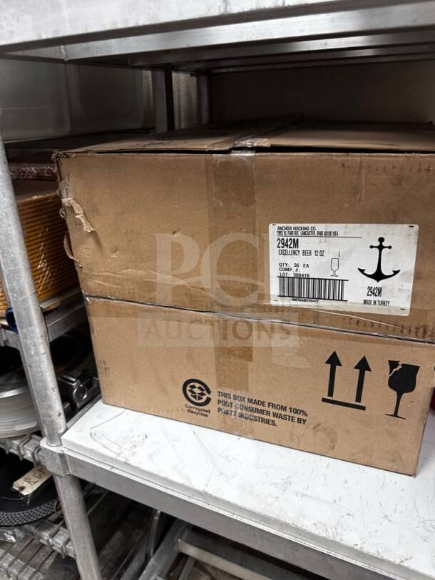Box of Anchor Hocking 2942M Excellency 12 oz beer glasses, pristine condition, brand new. Contains 36 glasses.