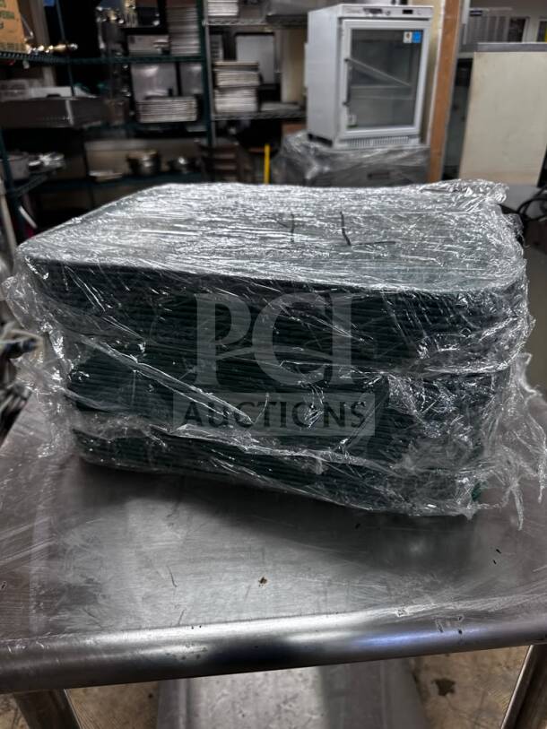 Stack of Cambro 1216414 Teal Camtrays, 12”x16”, wrapped in plastic, NSF certified, quantity of 25, ready for use.