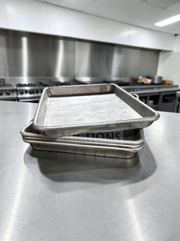 1/4 Size Aluminum Sheet Pans by Commercial Kitchen Smallwares, 18 gauge, used condition, stack of 40 pans for commercial use.