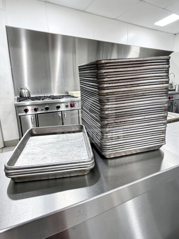 1/4 Size Aluminum Sheet Pans, 18 Gauge, Commercial Kitchen Smallwares, Model ALU-S-PAN-1166, Stack of 40, Used Condition.