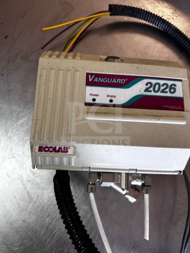Ecolab Vanguard 2026 commercial detergent dispenser, UL listed, fully tested, operational; features power and empty indicators.