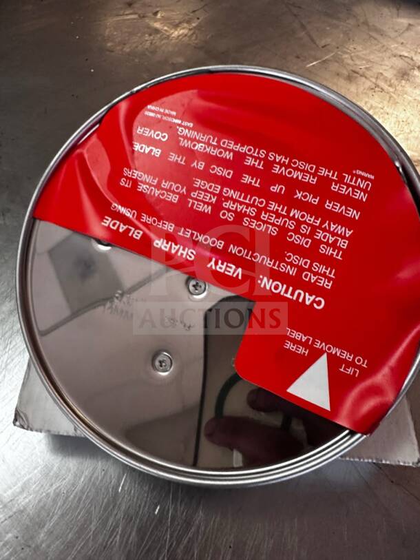 Pristine Waring BFP13 5/32” slicing plate, 4mm disc, with caution label. New, unused condition, ready for use.