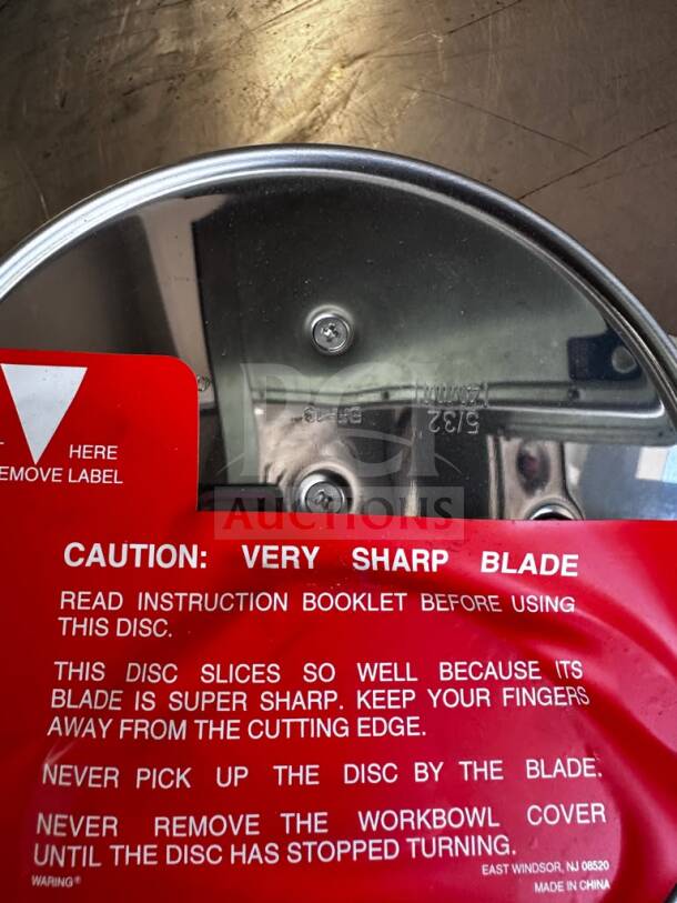 Waring BFP13 5/32” slicing plate, new, pristine condition, sharp blade warning, model WAR-S-DISC-1168, ready for use.