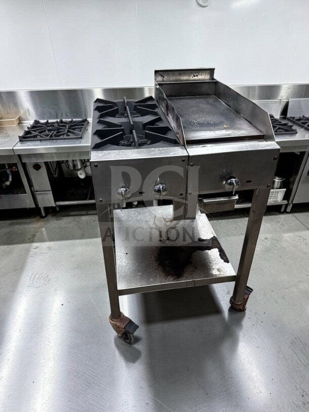 Outstanding condition 24” portable propane cooktop with two 12” open flame burners and 12” iron griddle on stainless steel stand.