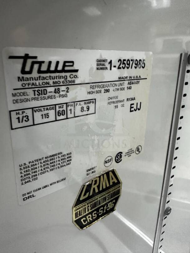True TSID-48-2 curved glass deli display case, NSF listed, fully operational, serial 1-2597985, excellent condition.
