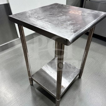 Stainless steel 24"x24" commercial work table in immaculate condition, ideal for prep work, features lower shelf.
