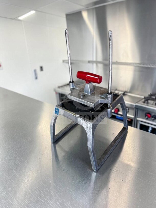 Vollrath 55002 InstaCut 5.0 Manual Dicer in outstanding condition on a table, NSF certified, made in USA.