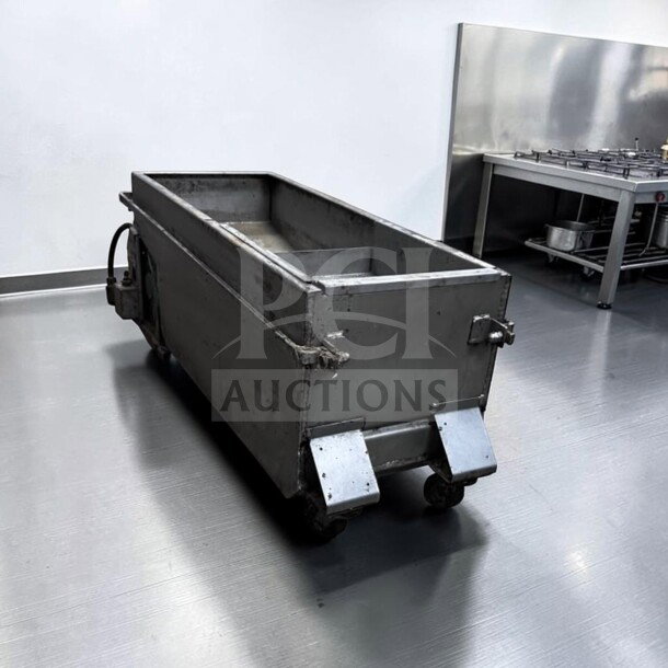 Portable commercial fryer oil filtration system, excellent condition, fully operational, stainless steel, on wheels.
