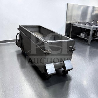 Portable commercial fryer oil filtration system, excellent condition, fully operational, stainless steel, on wheels.
