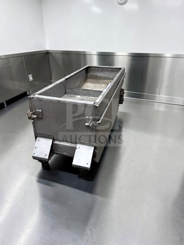 Commercial mobile fryer oil filtration system in excellent condition, industrial-grade metal, portable on wheels, fully operational.