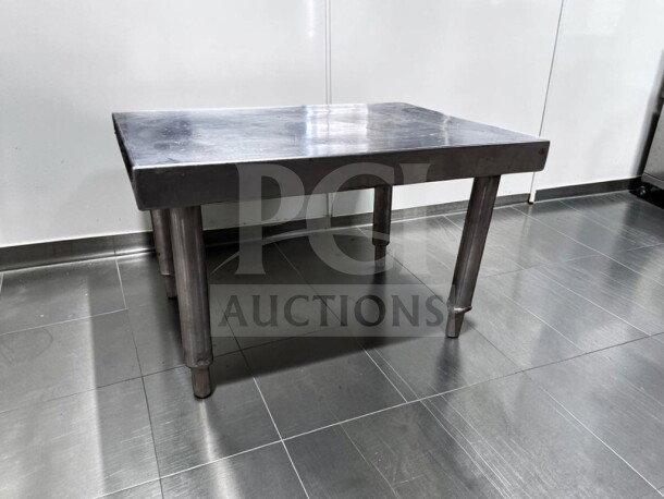 Heavy duty stainless steel commercial equipment stand, 24"x18"x15", top-tier condition, ready for use.
