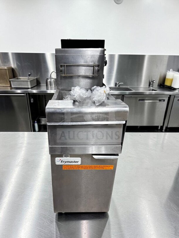 Prime condition Frymaster PMJ145 gas floor fryer, full pot, 50 lb capacity, 122,000 BTU, fully tested, visible branding.